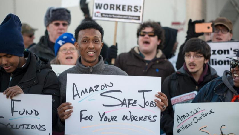 Amazon’da ‘fiili grevlerin’ iç yüzü – Taj Ali (Tribune /ETHA) Amazon’da ‘fiili grevlerin’ iç yüzü – Taj Ali (Tribune /ETHA)